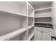 Large walk-in pantry with ample shelving and granite countertop at 3011 Silvapine Ne Trl, Atlanta, GA 30345