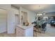 Open concept kitchen with island, stainless steel appliances, and pantry at 591 River Gardens Se Dr, Atlanta, GA 30354
