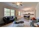 Open floor plan with a modern kitchen and comfortable living area at 591 River Gardens Se Dr, Atlanta, GA 30354