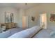Main bedroom with sitting area and access to bathroom and closet at 591 River Gardens Se Dr, Atlanta, GA 30354