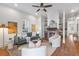 Bright living room with hardwood floors, fireplace, and comfy seating at 771 Tift Sw Ave, Atlanta, GA 30310