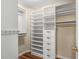 Large walk-in closet with ample shelving and hanging space at 2714 Vinings Oak Se Dr, Atlanta, GA 30339