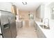 Modern kitchen with stainless steel appliances and light gray cabinets at 500 Chimney House Ct, Stone Mountain, GA 30087