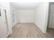 Bright living room with hardwood floors and large window at 500 Chimney House Ct, Stone Mountain, GA 30087