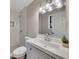 Modern bathroom with gray vanity and white subway tile at 80 Yvette Ne Ct, Kennesaw, GA 30144