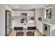 Modern kitchen with white cabinets, quartz countertops, and subway tile backsplash at 80 Yvette Ne Ct, Kennesaw, GA 30144