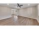 Spacious living room with hardwood floors and ceiling fan at 80 Yvette Ne Ct, Kennesaw, GA 30144