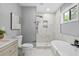 Spa-like bathroom featuring a large shower and a freestanding tub at 819 Norwood Se Rd, Atlanta, GA 30315