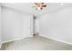 Bright bedroom with gray walls, vinyl flooring, and ceiling fan at 819 Norwood Se Rd, Atlanta, GA 30315