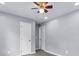 Spacious bedroom with ceiling fan and hardwood floors at 819 Norwood Se Rd, Atlanta, GA 30315