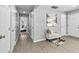 Gray hallway with light gray walls and hardwood floors at 819 Norwood Se Rd, Atlanta, GA 30315