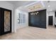 Elegant dining room with dark-stained wall detail and chandelier at 2297 Lake Ridge Ter, Lawrenceville, GA 30043