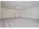 Large basement bedroom with full bathroom and carpet flooring at 3278 Greenhill Dr, Villa Rica, GA 30180