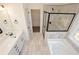 Luxurious bathroom with double vanity, garden tub, and frameless shower at 3278 Greenhill Dr, Villa Rica, GA 30180