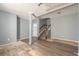 Unfinished basement with gray walls and new flooring at 94 Crumley Se St, Atlanta, GA 30312