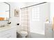 Clean and bright bathroom with a shower/tub combo and white vanity at 1797 Hosea L Williams Se Dr, Atlanta, GA 30317