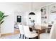 Bright dining room with a wood table and modern pendant light at 1797 Hosea L Williams Se Dr, Atlanta, GA 30317