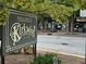 Welcome to Kirkwood neighborhood sign with storefronts visible in the background at 1797 Hosea L Williams Se Dr, Atlanta, GA 30317