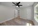 Bright bedroom with wood-look flooring and ceiling fan at 1841 Bayberry Dr, Atlanta, GA 30311