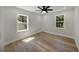 Spacious bedroom with wood-look flooring and ceiling fan at 1841 Bayberry Dr, Atlanta, GA 30311