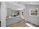 Modern kitchen with gray cabinets and quartz countertops at 1841 Bayberry Dr, Atlanta, GA 30311