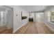 Open living space with hardwood floors and modern art at 1841 Bayberry Dr, Atlanta, GA 30311