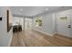 Light and airy living area with hardwood floors and kitchen access at 1841 Bayberry Dr, Atlanta, GA 30311