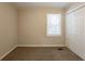 Simple bedroom with single window and large closet at 29 Oak Sw Dr, Atlanta, GA 30354