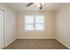 Spacious bedroom featuring a large window and ceiling fan at 29 Oak Sw Dr, Atlanta, GA 30354