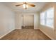 Living room with hardwood floors, ceiling fan and neutral walls at 29 Oak Sw Dr, Atlanta, GA 30354