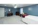 Spacious finished basement bedroom with neutral carpeting and walls at 399 Towler Dr, Loganville, GA 30052