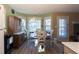 Eat in kitchen with bay window and wood cabinets at 399 Towler Dr, Loganville, GA 30052