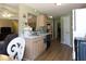 Kitchen with light wood cabinets and granite counters at 399 Towler Dr, Loganville, GA 30052