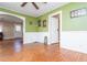 Bright living room features hardwood floors and an arched doorway at 4471 Gibson Pl, Acworth, GA 30101