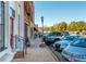 Street view of parked cars and shops at 4471 Gibson Pl, Acworth, GA 30101