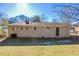 Brick house with backyard and trees at 454 Oak Se Dr, Atlanta, GA 30354
