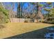 Backyard with wooden fence and grass at 454 Oak Se Dr, Atlanta, GA 30354