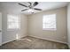 Bedroom with ceiling fan, neutral walls, and carpet at 454 Oak Se Dr, Atlanta, GA 30354