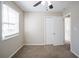 Spacious bedroom with neutral walls, carpet, and ceiling fan at 454 Oak Se Dr, Atlanta, GA 30354