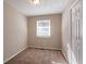 Simple bedroom with neutral walls and carpet at 454 Oak Se Dr, Atlanta, GA 30354