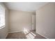 Simple bedroom with neutral walls and carpet flooring at 454 Oak Se Dr, Atlanta, GA 30354