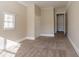 Bright bedroom with neutral walls, carpet, and double-door closet at 454 Oak Se Dr, Atlanta, GA 30354