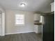 Bright dining room with wood-look floors and adjacent to kitchen at 454 Oak Se Dr, Atlanta, GA 30354