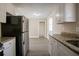 Updated kitchen with granite countertops and stainless steel appliances at 454 Oak Se Dr, Atlanta, GA 30354