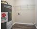 Laundry area with shelving and water heater at 454 Oak Se Dr, Atlanta, GA 30354