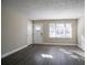 Spacious living room with wood-look flooring and large windows at 454 Oak Se Dr, Atlanta, GA 30354