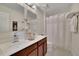 Double vanity bathroom with shower at 104 Johnston Farm Ln, Woodstock, GA 30188