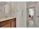 Clean bathroom with single vanity and view to bedroom at 104 Johnston Farm Ln, Woodstock, GA 30188