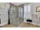 Modern bathroom with glass shower and stylish fixtures at 104 Johnston Farm Ln, Woodstock, GA 30188