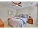 Bedroom with a ceiling fan and queen-size bed at 104 Johnston Farm Ln, Woodstock, GA 30188